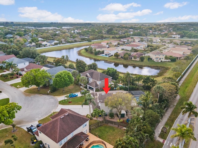 aerial view featuring a water view and a residential view