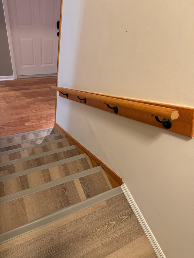 1458 N Lawnwood Cir Unit 23A, Fort Pierce, FL 34950 - stairs with baseboards and wood finished floors