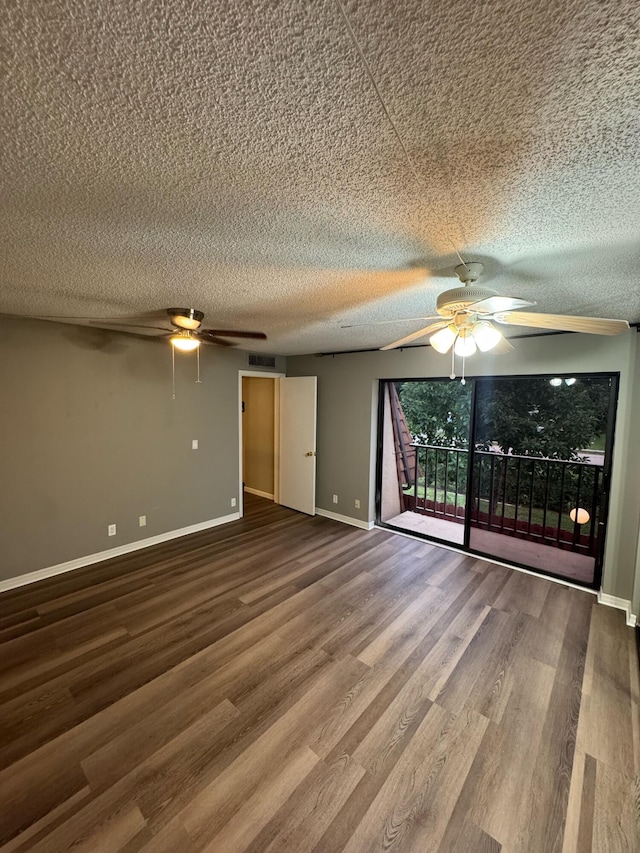 1458 N Lawnwood Cir Unit 23A, Fort Pierce, FL 34950 - empty room with ceiling fan, wood finished floors, a textured ceiling, and baseboards