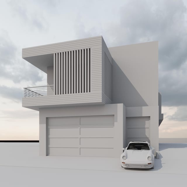 view of front facade featuring a balcony, a garage, and stucco siding