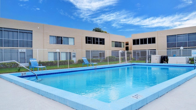 community pool with fence