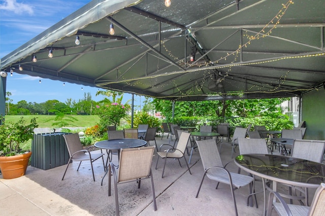 view of patio / terrace featuring a gazebo and outdoor dining space