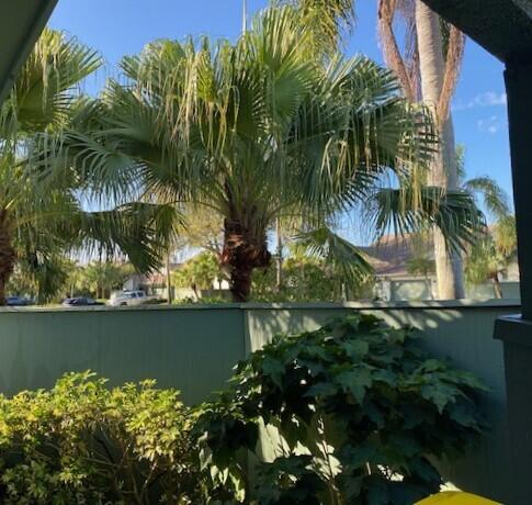 6764 SE Bunker Hill Dr, Hobe Sound, FL 33455 - view of swimming pool featuring fence
