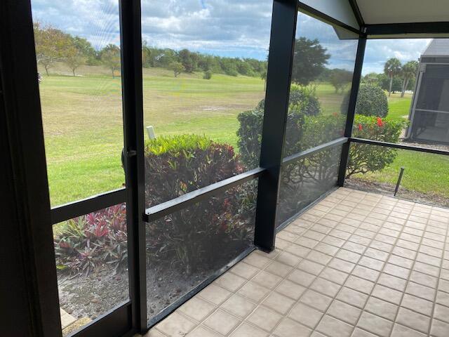 6764 SE Bunker Hill Dr, Hobe Sound, FL 33455 - view of unfurnished sunroom