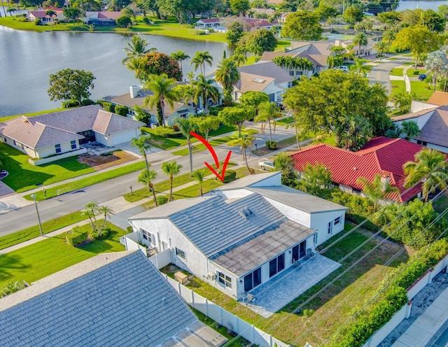 aerial view with a water view and a residential view