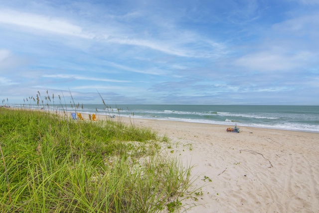 property view of water with a beach view