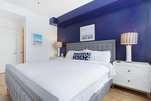 bedroom featuring light wood-style floors