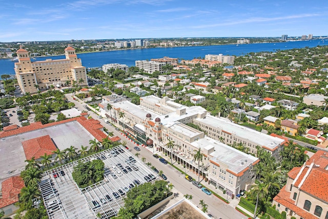 aerial view featuring a water view and a view of city