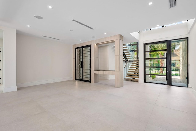 191 W Coconut Palm Rd, Boca Raton, FL 33432 - empty room featuring stairway, baseboards, and recessed lighting