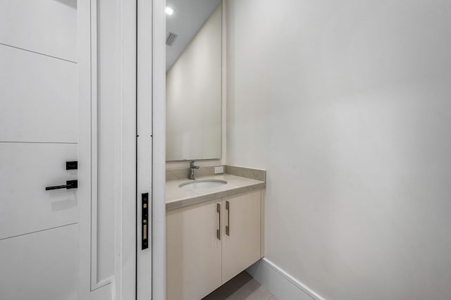 191 W Coconut Palm Rd, Boca Raton, FL 33432 - bathroom with vanity and baseboards