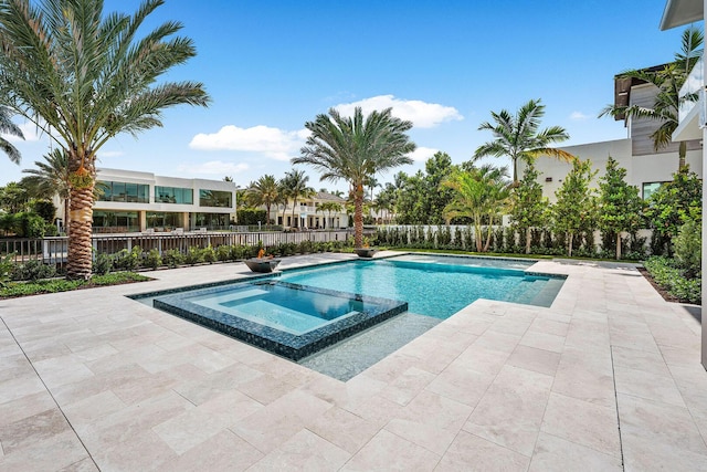 191 W Coconut Palm Rd, Boca Raton, FL 33432 - view of swimming pool with a pool with connected hot tub and a patio