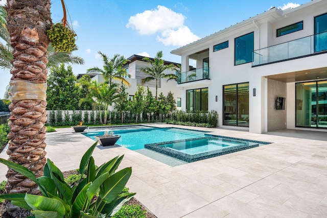 191 W Coconut Palm Rd, Boca Raton, FL 33432 - view of swimming pool featuring a patio area and a pool with connected hot tub