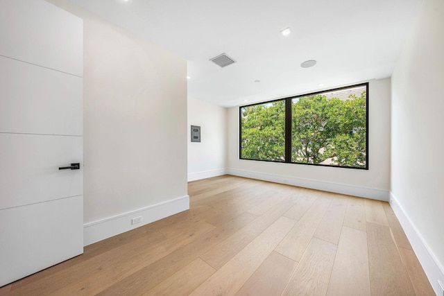 191 W Coconut Palm Rd, Boca Raton, FL 33432 - spare room featuring light wood-type flooring, baseboards, and recessed lighting