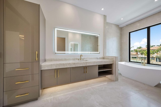 191 W Coconut Palm Rd, Boca Raton, FL 33432 - bathroom with a soaking tub, vanity, and marble finish flooring
