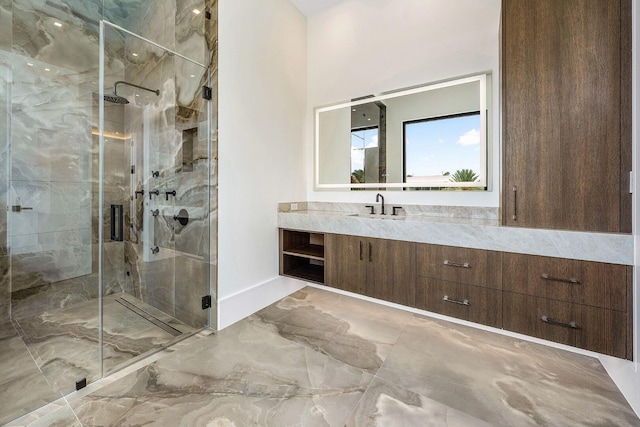 191 W Coconut Palm Rd, Boca Raton, FL 33432 - full bath with vanity, marble look tile flooring, a marble finish shower, and baseboards