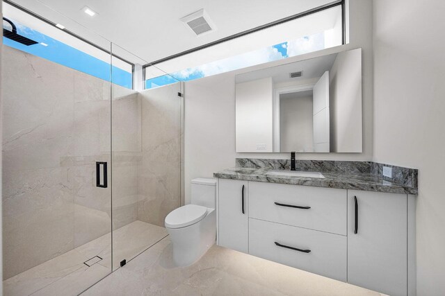 191 W Coconut Palm Rd, Boca Raton, FL 33432 - bathroom with toilet, a stall shower, and vanity