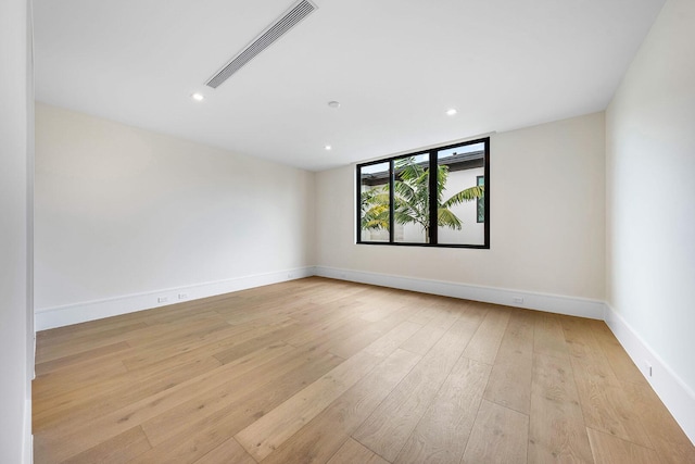 191 W Coconut Palm Rd, Boca Raton, FL 33432 - empty room featuring recessed lighting, light wood-style floors, and baseboards