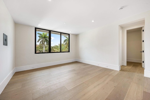191 W Coconut Palm Rd, Boca Raton, FL 33432 - unfurnished room featuring light wood-style flooring, baseboards, recessed lighting, and a smoke detector