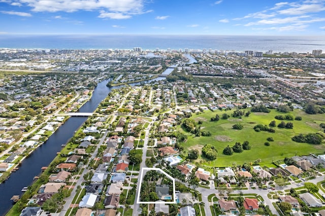 aerial view with a water view and a residential view