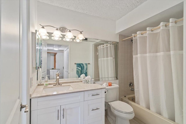 bathroom featuring shower / bath combination with curtain, toilet, a textured ceiling, and vanity