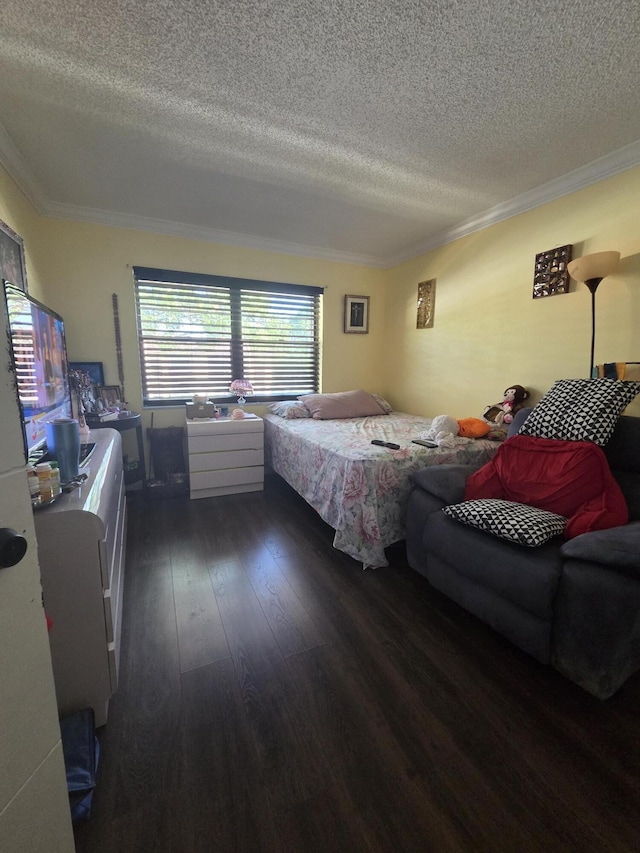 bedroom with crown molding, a textured ceiling, and dark wood-type flooring