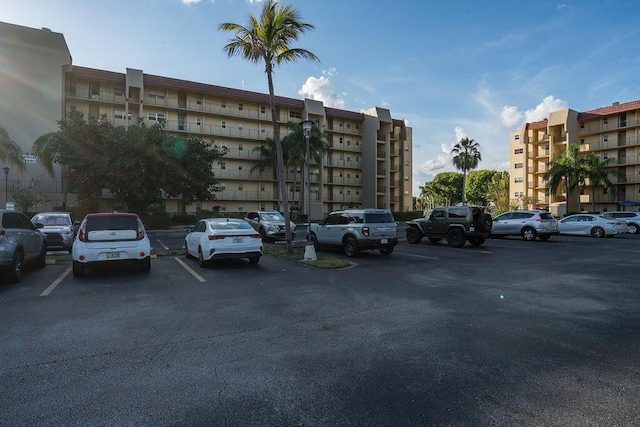 view of property with uncovered parking