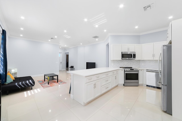 kitchen with visible vents, light tile patterned flooring, stainless steel appliances, and open floor plan