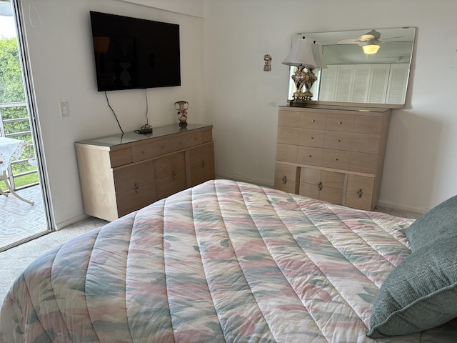 bedroom featuring carpet floors, access to outside, and baseboards