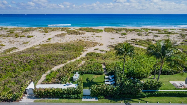 aerial view featuring a water view and a view of the beach