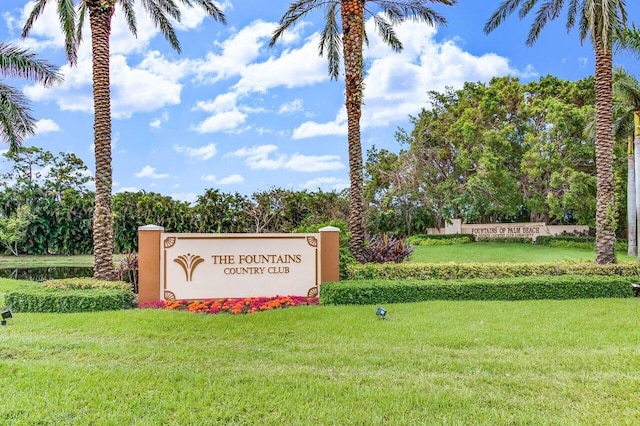 community sign with a lawn