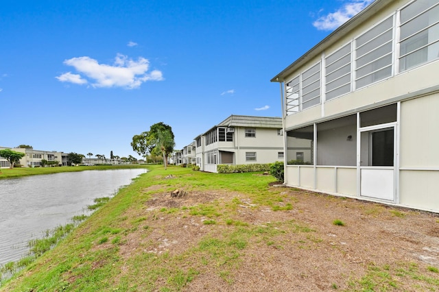 view of yard with a water view