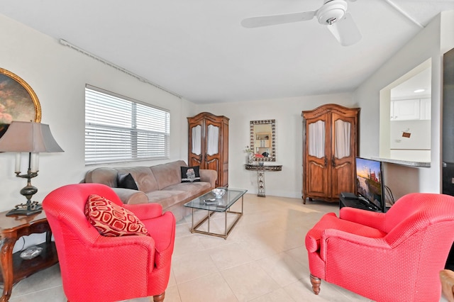 living area featuring a ceiling fan