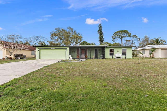 ranch-style house with a garage, driveway, and a front yard