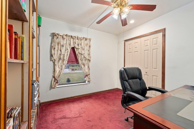 office space featuring ceiling fan, carpet flooring, and baseboards