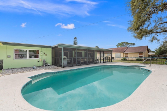 view of pool featuring a fenced in pool, a sunroom, and fence