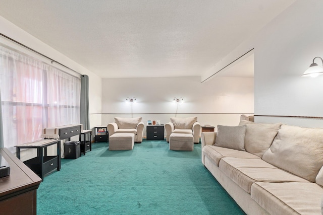 carpeted living room featuring a textured ceiling