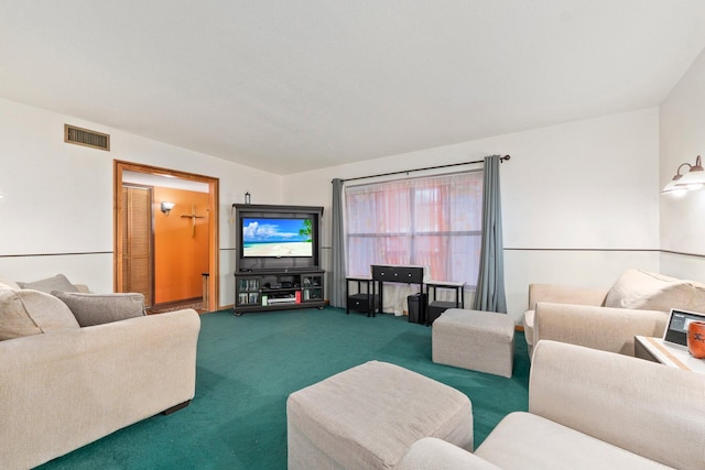 living room with carpet and visible vents