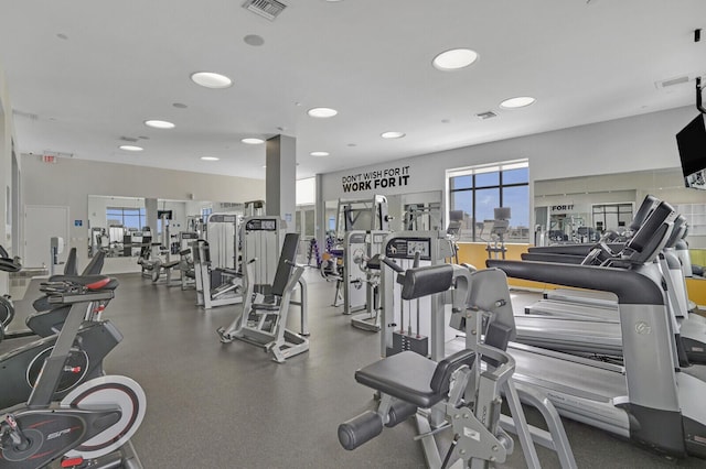 exercise room featuring visible vents