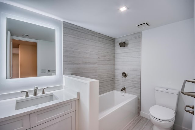 full bathroom with shower / bath combination, visible vents, toilet, and vanity