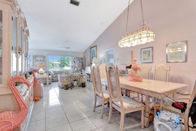 dining space with high vaulted ceiling, visible vents, ceiling fan, and light tile patterned floors