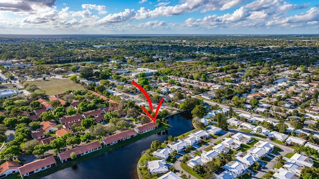 aerial view featuring a water view and a residential view