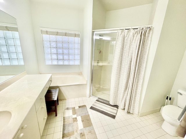 bathroom with tile patterned floors, a stall shower, and toilet