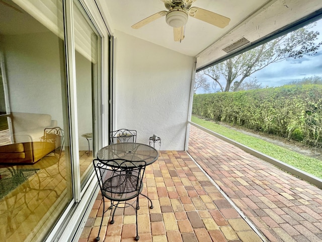 view of patio / terrace featuring a ceiling fan