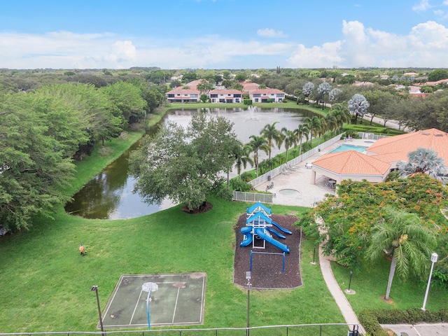 birds eye view of property with a water view