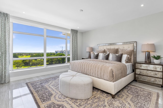 bedroom with recessed lighting and baseboards