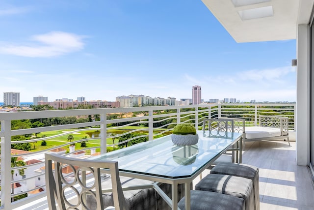 balcony featuring a city view