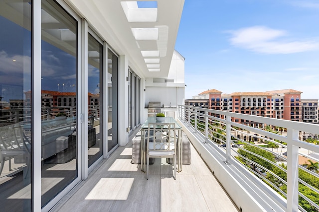 balcony featuring area for grilling