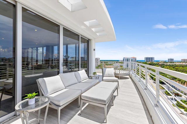 balcony featuring a view of city and an outdoor living space