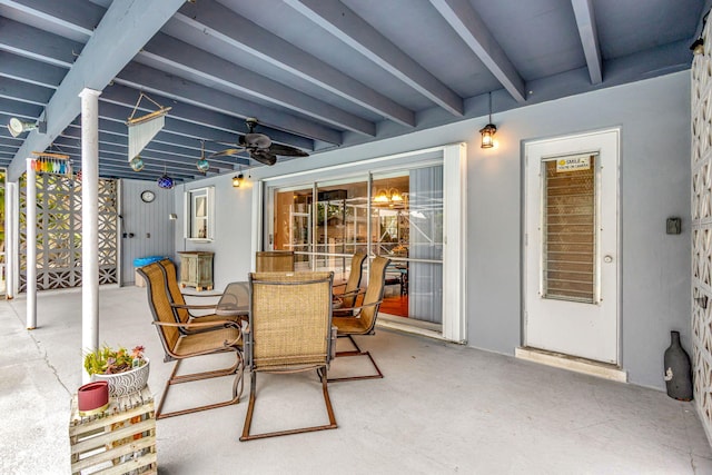 view of patio featuring outdoor dining space and a ceiling fan