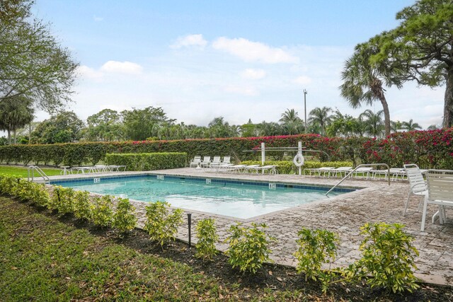 community pool featuring a patio